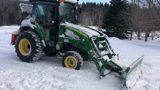 First snow with no chains John Deere 3046r tried to plow the driveway [upl. by Llahsram]