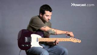 How to Tune a Guitar to E Flat  Guitar Lessons [upl. by Yehc]