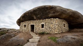 Build a shelter in the forest under a large rock  cooking and survival [upl. by Cirala]