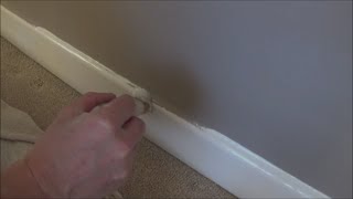 Undercoating skirting boards without taking the carpet up [upl. by Junette]