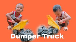 Car Dumper Truck Playing by Kids [upl. by Sharpe783]