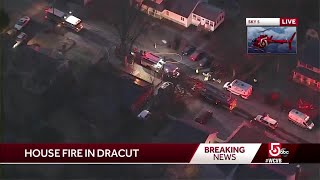 Crews battle house fire in Dracut [upl. by Nnylarak]