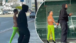 Bianca Censori pairs bandeau top with lowslung neon tights for date with Kanye West [upl. by Alleuqcaj]