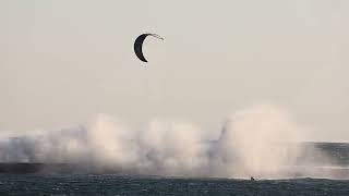 Kitesurfers take flight as gusty winds large waves batter Frankfort [upl. by Wystand394]