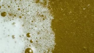 Yellow Soda With Bubbles Stock Video [upl. by Ailahs]