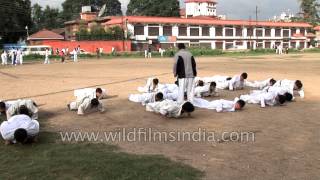 Nepali Taekwondo students do push ups during training session [upl. by Heilner]