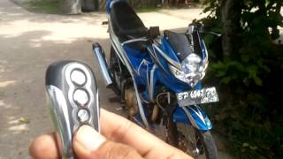 TUTORIAL PEMAKAIAN REMOT ALARM MALING pada motor S [upl. by Tray819]