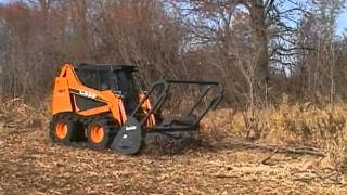 Loftness Timber Ax Hydraulic SkidSteer Mounted Brush Cutter and shredder [upl. by Nightingale]