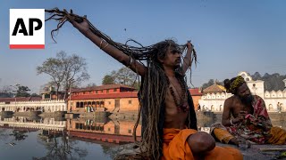 Hindu devotees celebrate Shivaratri at Pashupatinath temple in Kathmandu [upl. by Obidiah]