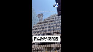 Man throws furniture off 20thfloor NYC highrise [upl. by Yevi]