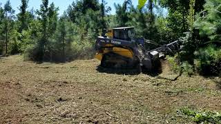 Loftness Battle Ax on Deere 333G [upl. by Lanfri]