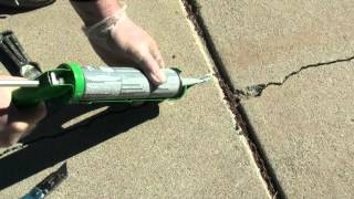 How to Fix a Crack in a Driveway [upl. by Neelahtak]