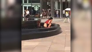 Diese Frau erleichtert sich in einem öffentlichen Brunnen [upl. by Atiuqrehs]