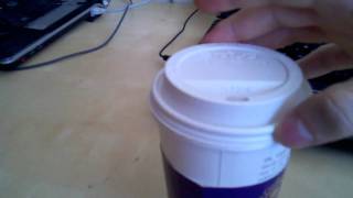 How to correctly put a lid on a coffee cup [upl. by Serles]