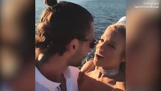 Tammy Hembrow and Reece Hawkins kiss up a storm aboard [upl. by Gifferd]