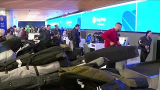 Baggage system breakdown causes delays long lines to check bags at DIA Sunday [upl. by Nnaael]