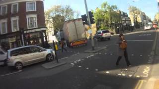 Articulated lorry gets stuck turning in London and driver puts himself in the blind spot [upl. by Aronal974]