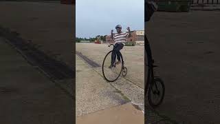 Penny farthing high wheel unicycles unicycling mike arotsky sings blue suade shoes [upl. by Atalante73]