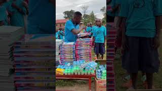 Supporting children’s education by giving them scholastics materials [upl. by Emixam]