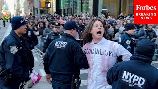 WATCH ProPalestinian Protesters Are Detained After Disrupting Macy’s Thanksgiving Day Parade [upl. by Eirrac]