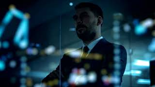 Handsome Successful Businessman Looks out of Office Window City in the Night Free iStock Footage [upl. by Laufer]