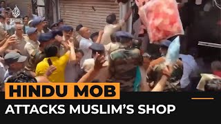 Video shows Hindu mob attacking Muslimowned shop in India  AJ Shorts [upl. by Ellimahs]