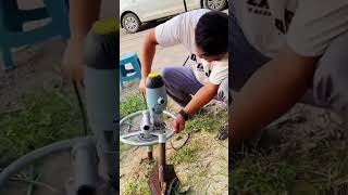 Handheld spiral ground anchor installation drill [upl. by Darell801]