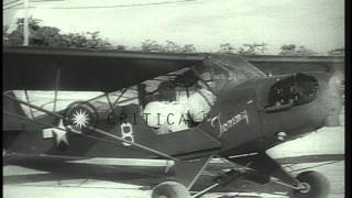 US Army Air Forces light Grasshopper aircraft on a reconnaissance mission on BougHD Stock Footage [upl. by Isyed]