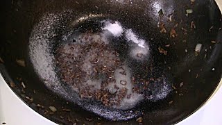 How To Clean A Wok Seasoning And Reconditioning A Wok How To Make Your Wok NonStick [upl. by Ule]