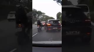 Motorcycle collides with Porsche on AYE driver opens door leading to second crash [upl. by Gnilrac]