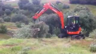 Log Grapple  Intermercato on Hitachi excavator feeding chipper [upl. by Yeo676]