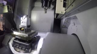 Makino DA300 5Axis Vertical Mill IMTS 2016 Pallet Loading Demo [upl. by Ardnaiek]