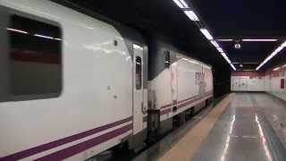 Renfe 252050 y tren arco saliendo de Nuevos Ministerios [upl. by Selda859]