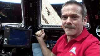 Hadfield behind the controls of Canadarm2 [upl. by May173]