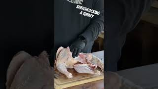 Spatchcocking a turkey before direct heat cooking on Weber Smokey Mountain turkey recipe food [upl. by Yanetruoc107]