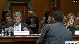 Micki Witthoeft entersFBI Director Chris Wray’s Senate Appropriation Hearing [upl. by Amocat]