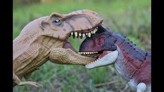 Jurassic World 1 vs Jurassic World 2 T Rex vs Carnotaurus Toy [upl. by Nwahsem]