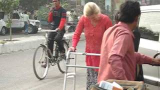 Amanda Walking with Leg Braces in the Streets of Delhi  One Brave Woman [upl. by Wang564]