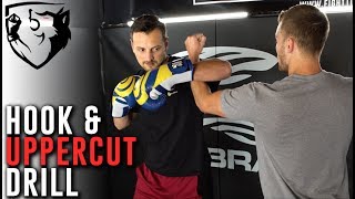 Teaching the Hook amp Uppercut to Beginners quotBicep on Forearmquot [upl. by Erhart766]