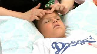 Massaging Nose of Child to Treat Sinus Congestion [upl. by Sikram]