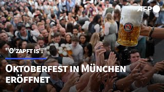 quotOzapft isquot Oktoberfest in München eröffnet  AFP [upl. by Erick767]