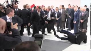 Topless protesters confront Vladimir Putin and Angela Merkel [upl. by Blum]