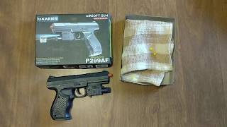 HOW TO LOAD PLASTIC BBs INTO 5 UKARMS P299AF AIRSOFT BB GUN WITH LASER [upl. by Ribaj579]