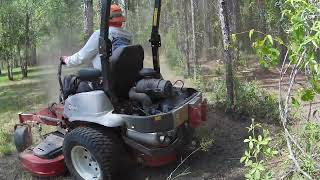 Exmark With Ballard Blades VS Pine Forest exmark exmarkmanufacturing mowing landclearing mower [upl. by Bruns]