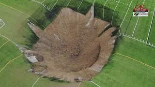 Video shows massive sinkhole open up in the middle of soccer field in Illinois [upl. by Alane666]