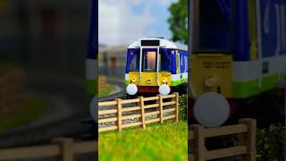 Class 121 Silverlink Passenger Train Passing on the Railway train modeltrains modelrailway [upl. by Soilisav797]