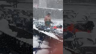 Shirtless Snow Shoveler Slides Down Chute at Buffalo Bills Stadium During Blizzard Conditions [upl. by Mcmath]