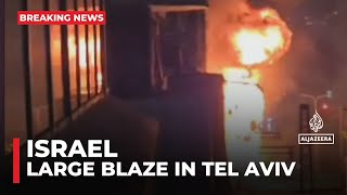 Large blaze in Tel Aviv after raid sirens sound [upl. by Annais]