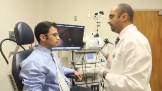 Laryngoscopy and stroboscope to examine the vocal cords [upl. by Ahsahtan]