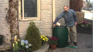 How to install and use a rain barrel with added slowdrainage cap [upl. by Grous]